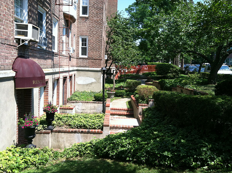 flowers in front of highlands apartments