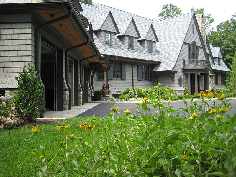 mansion with landscaping in front