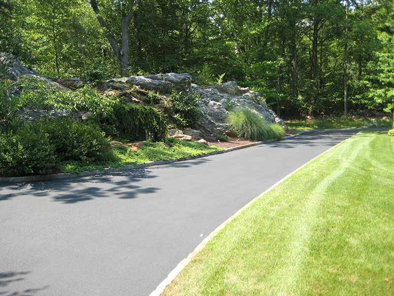 long beautiful paved driveway 