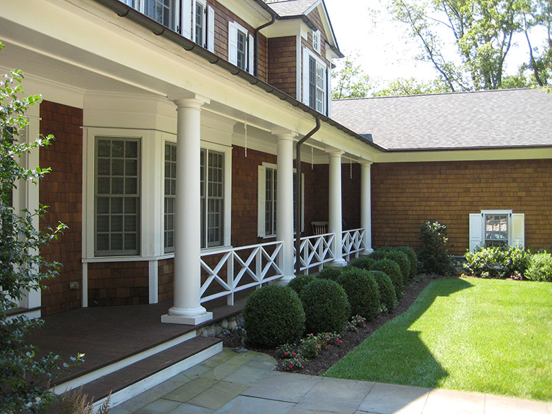 white columns in front of house